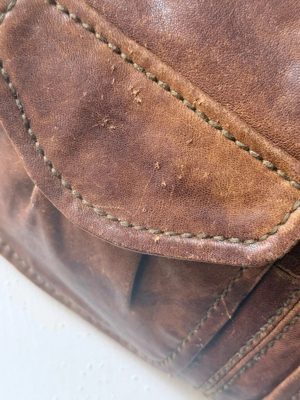 Hyper Distressed Fossil Vintage Bag.